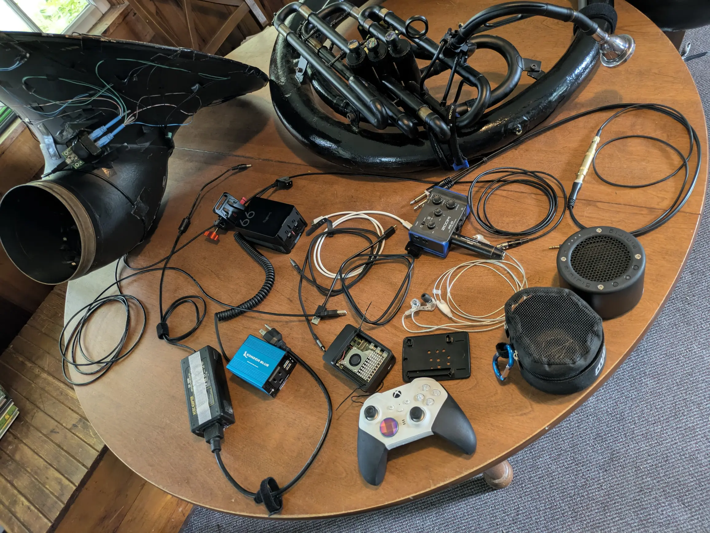 sousaphone with gear on table